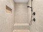 Primary shower with bench