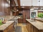 Storage is not a problem or counter space in this kitchen