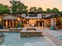 Wade in pool with hot tub right off the kitchen area in home