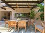 Outdoor dining with has heater, opens to kitchen