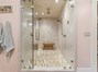 The best shower I've seen- 3 shower heads and it's a steam shower too!