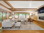 What a living room! Wood beams, true oak flooring and wood cased windows