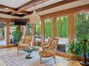 Nook looks onto the pool, outdoor dining and firepit area