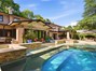 Custom pool with stream tile motif