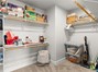Primary bedroom walk-in closet