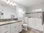 Primary bathroom showing walk -in tub - handicap accessible