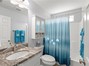 Main bathroom - located in between the 2 bedrooms & off of living room area