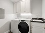 Separate laundry room with utility sink
