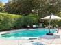 Poolside umbrella included