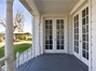 primary bedroom doors out to north side of home