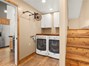 Laundry area and stairs to bonus area _6494 Loyola Ct Magalia, CA 95954