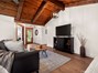 Family Room with beautiful vaulted wood ceilings