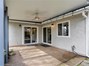 covered patio with access to master bedroom and kitchen