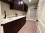 Laundry room w/sink and storage
