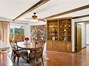 Dining room connecting large living room and kitchen