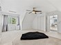 Spacious primary bedroom on upper level