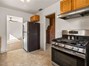 Enjoy cooking on the gas range, with convenient access to the spacious laundry and pantry area!