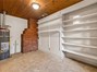 Oversized utility room off of the kitchen, doubles as a huge walk in pantry