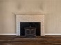 traditional fireplace with wood burning insert.