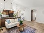 Living room is open to the kitchen