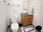Disconnected converted garage half bath