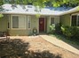 level concrete walkway to front door