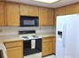 oak cabinets provide lots of storage space