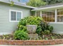 Front yard flower garden and fountain