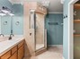 Primary bath with large walk in shower.