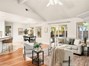 High ceiling, open concept livingroom & kitchen.
