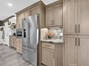 custom kitchen with tons of cabinets and storage