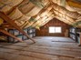 Virtually staged attic storage off of bonus room. SO MUCH STORAGE!