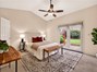Primary bedroom with access to the backyard