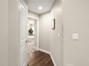 Hall leading to Primary Bedroom/Suite