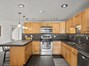 Kitchen w/ pull out cupboard drawers
