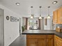 Kitchen looking through Dining to French Doors
