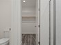 Main House Primary Bathroom and Walk-in Closet