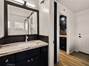 Half bathroom near laundry room and kitchen