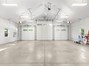 Shop includes EV charger and washer/dryer hookups.
