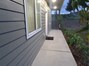 View of front walkway leading to front entry door.