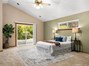 Spacious primary suite with access to the beautiful backyard!