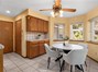 Kitchen nook with the view towards the pantry, bathroom and garage door