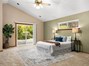 Huge Primary Suite with slider to the backyard.