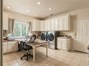Laundry room with work/quilting area