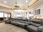 Large Living Room with Custom Lighting & Access to Back Deck