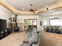 Large Living Room with Custom Lighting & Access to Back Deck