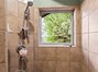 Primary Bathroom with Dual Vanities, Soaking Tub and Tiled Walk-In Shower.