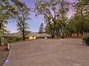 Lots of Parking- 2 Car Garage and Upper Level Parking for 3 more vehicles