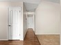 Entry way to living room and hallway.