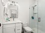Walk-in shower with tile all the way up to the ceiling!
